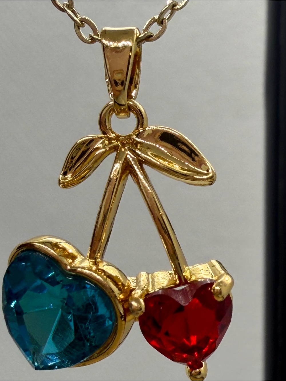 Gold-Tone Double Heart Cherry Pendant Necklace with Blue and Red Crystals